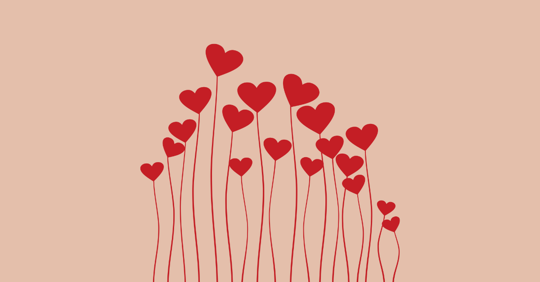 Valentine's Day illustration with red hearts on strings on beige background representing stress-free period care with umi menstrual disc