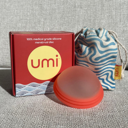 umi menstrual disc, cloth bag and packaging